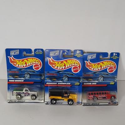 LOT 156: Eight Vintage Hot Wheels Lot Featuring Ford Bronco, School Bus and More