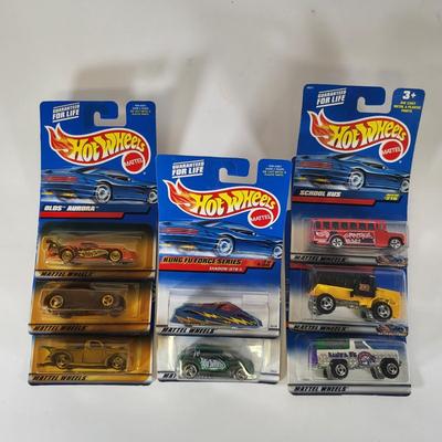 LOT 156: Eight Vintage Hot Wheels Lot Featuring Ford Bronco, School Bus and More