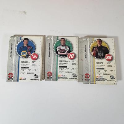 LOT 157: Multiple Nascar Memorabilia Items Including Autographs of Bobby Allison, Elliott Sadler and More