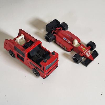 LOT 159: Vintage Lot of Six Matchbox Toy Cars and Matchbox Toy Car Carrying Case