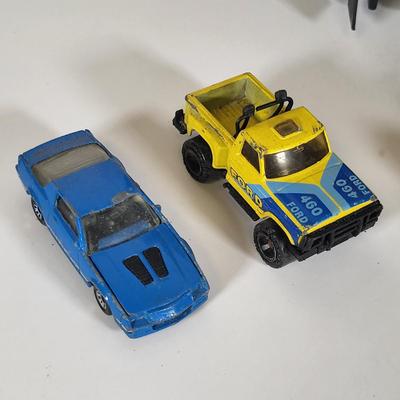 LOT 159: Vintage Lot of Six Matchbox Toy Cars and Matchbox Toy Car Carrying Case