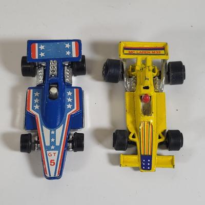 LOT 160: Vintage Toy Car and Carrying Case by Various Toy Manufacturers