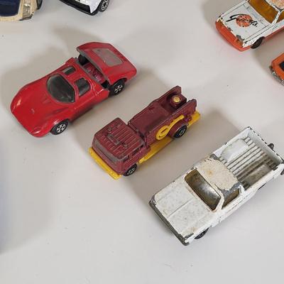 LOT 160: Vintage Toy Car and Carrying Case by Various Toy Manufacturers