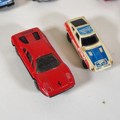 LOT 160: Vintage Toy Car and Carrying Case by Various Toy Manufacturers