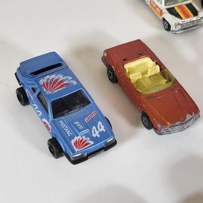 LOT 160: Vintage Toy Car and Carrying Case by Various Toy Manufacturers
