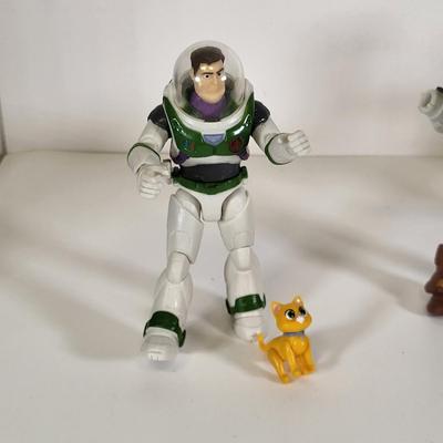 LOT 161: Eight Disney Toy Action Figures Including Characters from Star Wars and Buzz Lightyear