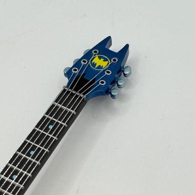 LOT 171: Hallmark Keepsake Guitar Magic Ornaments in Boxes: Wonder Woman Rocks & Batman Rocks