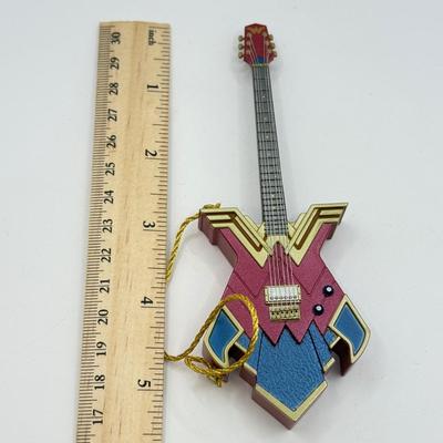 LOT 171: Hallmark Keepsake Guitar Magic Ornaments in Boxes: Wonder Woman Rocks & Batman Rocks