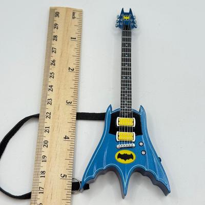 LOT 171: Hallmark Keepsake Guitar Magic Ornaments in Boxes: Wonder Woman Rocks & Batman Rocks