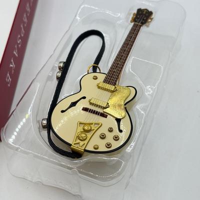 LOT 172: Hallmark Keepsake Guitar Ornaments in Boxes: 2023 Lookin' Out My Back Door & 2019 Rockin' Guitar