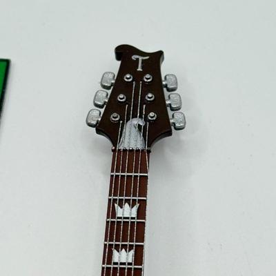 LOT 172: Hallmark Keepsake Guitar Ornaments in Boxes: 2023 Lookin' Out My Back Door & 2019 Rockin' Guitar