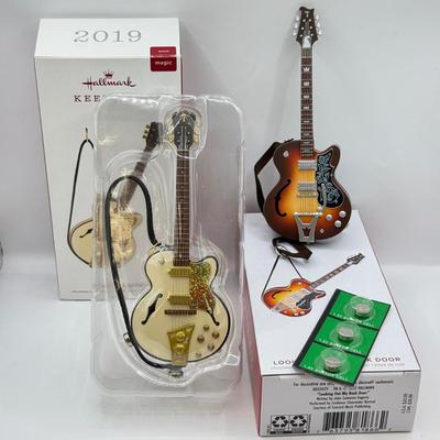 LOT 172: Hallmark Keepsake Guitar Ornaments in Boxes: 2023 Lookin' Out My Back Door & 2019 Rockin' Guitar