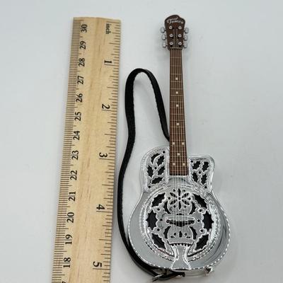 LOT 174: Hallmark Keepsake Magic Guitar Ornaments in Boxes: Run Run Rudolph & Up on the Housetop