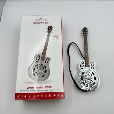 LOT 174: Hallmark Keepsake Magic Guitar Ornaments in Boxes: Run Run Rudolph & Up on the Housetop