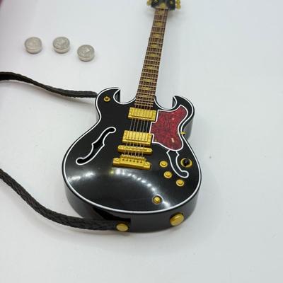 LOT 173: Hallmark Keepsake Guitar Ornaments in Boxes: The Thrill is Gone & Rock and Roll All Nite