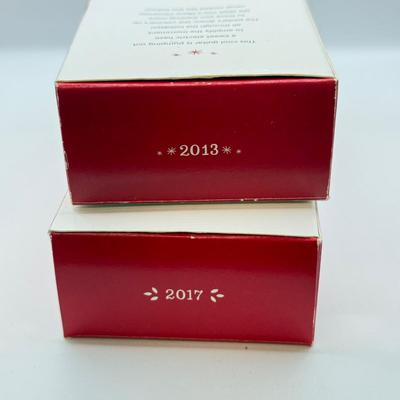 LOT 175: Hallmark Keepsake Magic Guitar Ornaments in Boxes: We Wish You a Merry Christmas & Santa Claus is Comin' to Town
