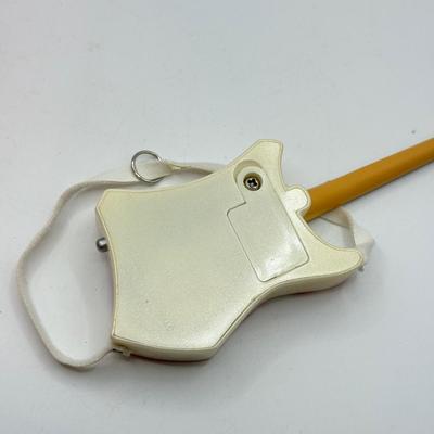LOT 175: Hallmark Keepsake Magic Guitar Ornaments in Boxes: We Wish You a Merry Christmas & Santa Claus is Comin' to Town