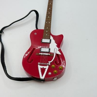 LOT 176: Hallmark Keepsake Ornaments in Boxes: Magic Guitar Rockin' Around the Christmas Tree, 1957 Ford Fairlane 500 & 2000...