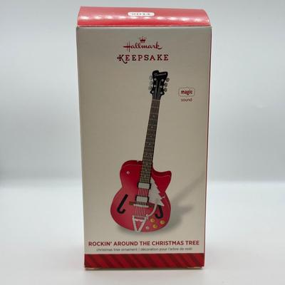 LOT 176: Hallmark Keepsake Ornaments in Boxes: Magic Guitar Rockin' Around the Christmas Tree, 1957 Ford Fairlane 500 & 2000...