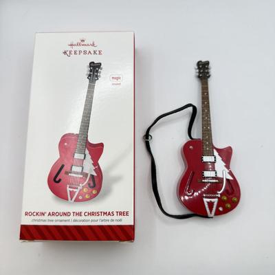 LOT 176: Hallmark Keepsake Ornaments in Boxes: Magic Guitar Rockin' Around the Christmas Tree, 1957 Ford Fairlane 500 & 2000...