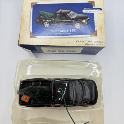 LOT 176: Hallmark Keepsake Ornaments in Boxes: Magic Guitar Rockin' Around the Christmas Tree, 1957 Ford Fairlane 500 & 2000...