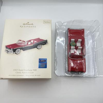 LOT 176: Hallmark Keepsake Ornaments in Boxes: Magic Guitar Rockin' Around the Christmas Tree, 1957 Ford Fairlane 500 & 2000...
