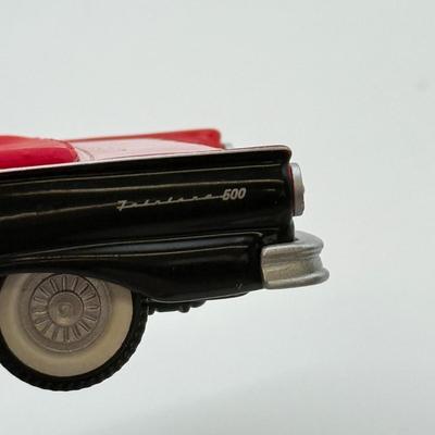 LOT 176: Hallmark Keepsake Ornaments in Boxes: Magic Guitar Rockin' Around the Christmas Tree, 1957 Ford Fairlane 500 & 2000...