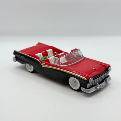 LOT 176: Hallmark Keepsake Ornaments in Boxes: Magic Guitar Rockin' Around the Christmas Tree, 1957 Ford Fairlane 500 & 2000...