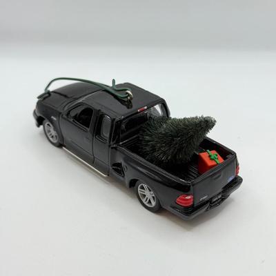 LOT 176: Hallmark Keepsake Ornaments in Boxes: Magic Guitar Rockin' Around the Christmas Tree, 1957 Ford Fairlane 500 & 2000...
