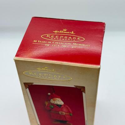 LOT 178: Lenox Fishing Santa, Hallmark Keepsake Ornament Kris Kringle & Trio of Santas all in Boxes