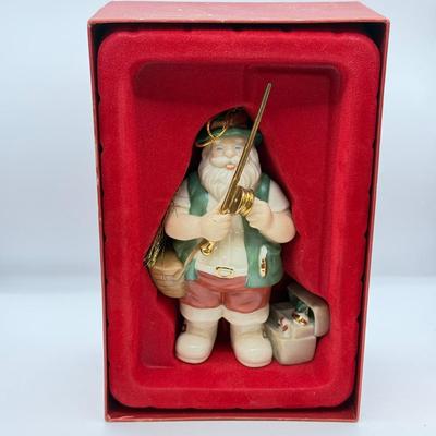 LOT 178: Lenox Fishing Santa, Hallmark Keepsake Ornament Kris Kringle & Trio of Santas all in Boxes