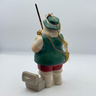 LOT 178: Lenox Fishing Santa, Hallmark Keepsake Ornament Kris Kringle & Trio of Santas all in Boxes
