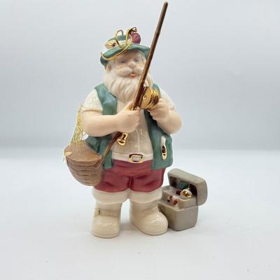 LOT 178: Lenox Fishing Santa, Hallmark Keepsake Ornament Kris Kringle & Trio of Santas all in Boxes