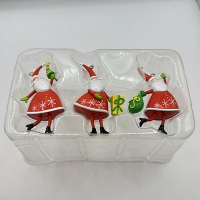 LOT 178: Lenox Fishing Santa, Hallmark Keepsake Ornament Kris Kringle & Trio of Santas all in Boxes