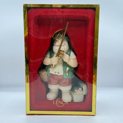 LOT 178: Lenox Fishing Santa, Hallmark Keepsake Ornament Kris Kringle & Trio of Santas all in Boxes