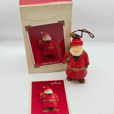 LOT 178: Lenox Fishing Santa, Hallmark Keepsake Ornament Kris Kringle & Trio of Santas all in Boxes