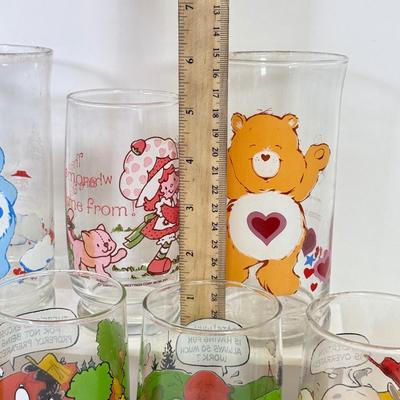 LOT 180: Collectible Glasses: Camp Snoopy, Strawberry Short Cake & Pizza Hut Care Bears: Grumpy & Tenderheart