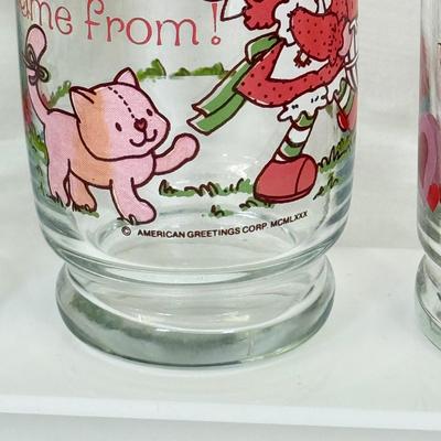 LOT 180: Collectible Glasses: Camp Snoopy, Strawberry Short Cake & Pizza Hut Care Bears: Grumpy & Tenderheart