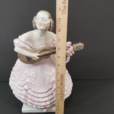 LOT 181: 14" Herend Porcelain Woman Playing Guitar