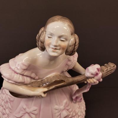 LOT 181: 14" Herend Porcelain Woman Playing Guitar