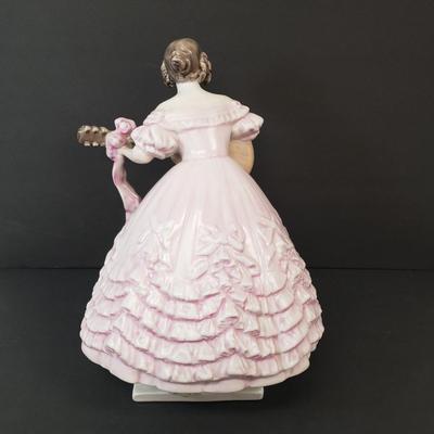 LOT 181: 14" Herend Porcelain Woman Playing Guitar