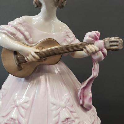 LOT 181: 14" Herend Porcelain Woman Playing Guitar