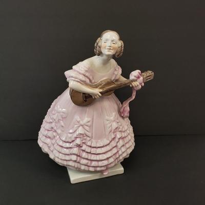 LOT 181: 14" Herend Porcelain Woman Playing Guitar