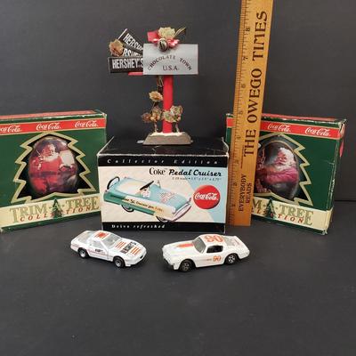 LOT 185: Coca Cola Holiday Ornaments & More