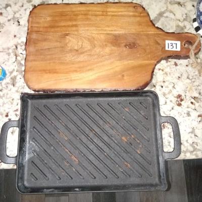 Cast iron griddle with wood cutting board