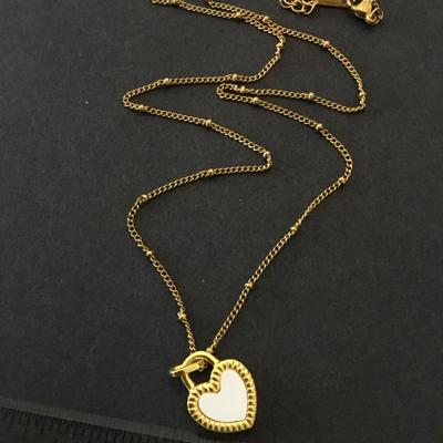 Cute nice gold tone black & white heart necklace
