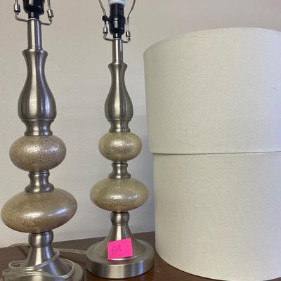 Silver tone table lamps with shades