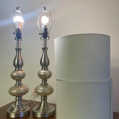 Silver tone table lamps with shades