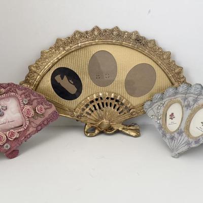 Sale Photo Thumbnail #117: Victorian-style gold gilt fan picture frame, 3 photo opening.
Vintage-style ceramic double picture frame blue 
Vintage-style ceramic one picture frame pink