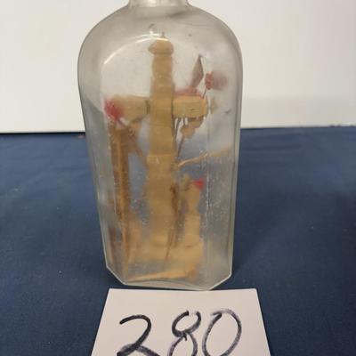 Vintage Cross in a Bottle